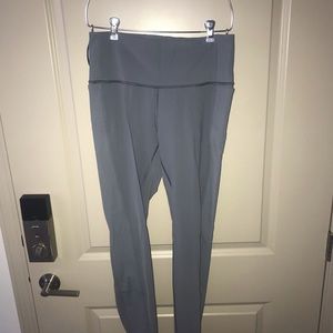Grey leggings with pockets.